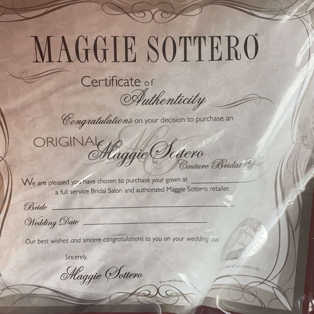 Maggie Sottero mermaid style ivory wedding dress